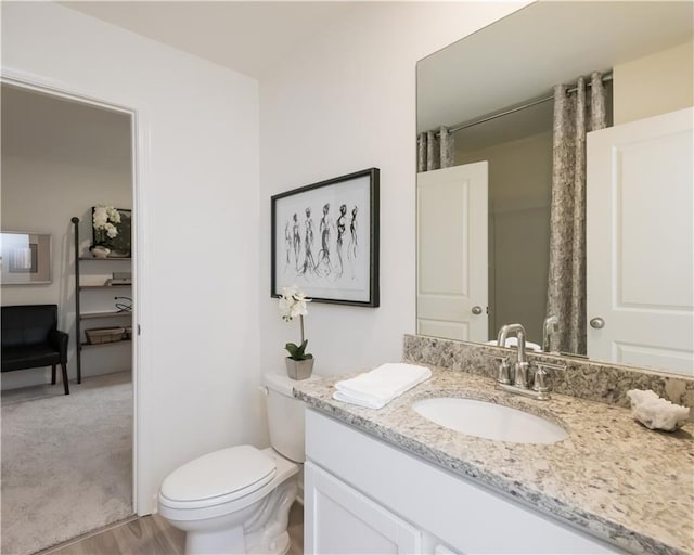 1577 Aiden Way Unit 39, Conyers, GA 30013 - bathroom featuring vanity and toilet