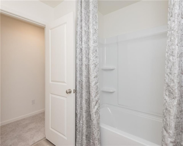 1577 Aiden Way Unit 39, Conyers, GA 30013 - bathroom with shower / bath combo and baseboards