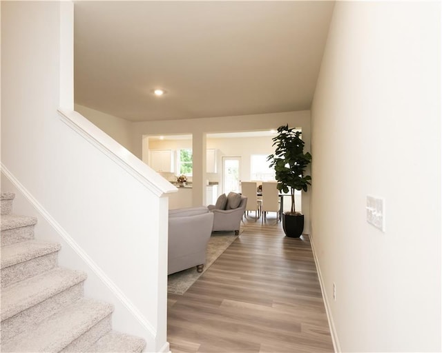 1577 Aiden Way Unit 39, Conyers, GA 30013 - stairway with baseboards, wood finished floors, and recessed lighting
