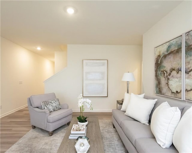 1577 Aiden Way Unit 39, Conyers, GA 30013 - living room with wood finished floors, baseboards, and recessed lighting