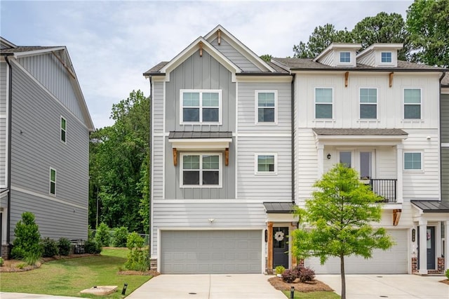 3518 Mount Blue Ave, Tucker, GA 30084 - view of property featuring board and batten siding, driveway, an attached garage, and a front yard