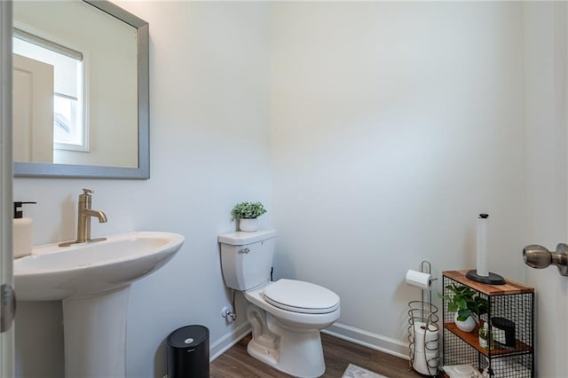 3518 Mount Blue Ave, Tucker, GA 30084 - bathroom featuring toilet, wood finished floors, and baseboards