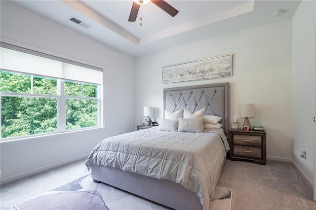 3518 Mount Blue Ave, Tucker, GA 30084 - carpeted bedroom with a raised ceiling, baseboards, and a ceiling fan