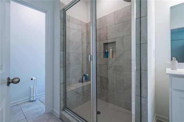 3518 Mount Blue Ave, Tucker, GA 30084 - full bath with a shower stall, tile patterned flooring, vanity, and baseboards