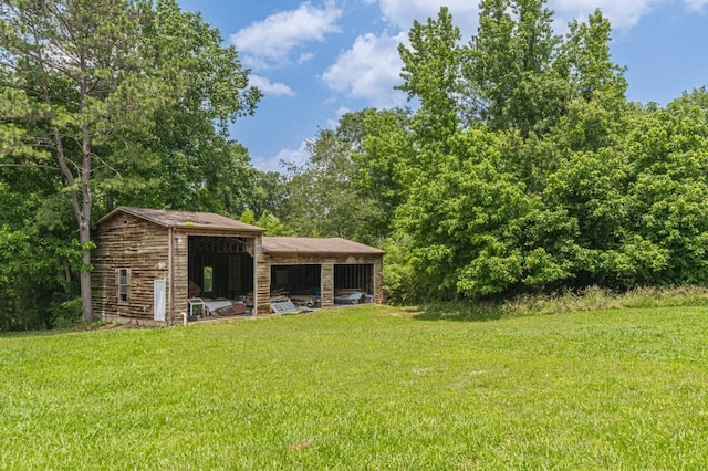 7928 S Giles Rd, Douglasville, GA 30135 - view of green lawn with an outbuilding and a pole building