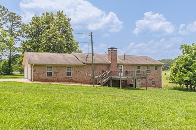 7928 S Giles Rd, Douglasville, GA 30135 - rear view of property featuring stairway, a deck, a lawn, a chimney, and a garage