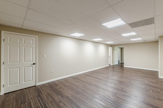 7928 S Giles Rd, Douglasville, GA 30135 - unfurnished room featuring wood finished floors, a drop ceiling, and baseboards