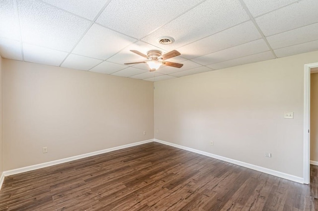 7928 S Giles Rd, Douglasville, GA 30135 - empty room featuring a paneled ceiling, a ceiling fan, dark wood-style floors, and baseboards