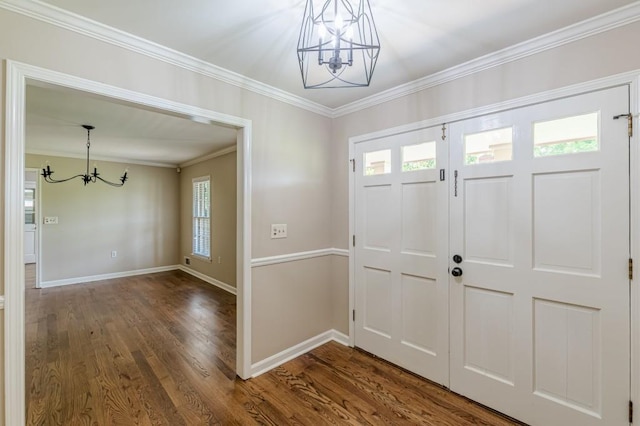 7928 S Giles Rd, Douglasville, GA 30135 - entrance foyer with a chandelier, baseboards, dark wood-style flooring, and ornamental molding