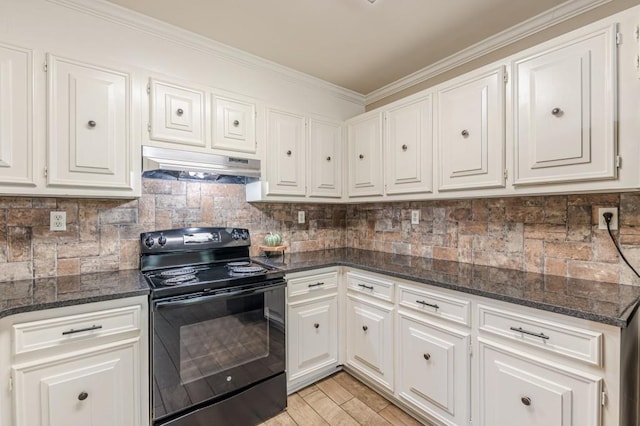 7928 S Giles Rd, Douglasville, GA 30135 - kitchen with black range with electric stovetop, under cabinet range hood, white cabinets, ornamental molding, and dark stone countertops