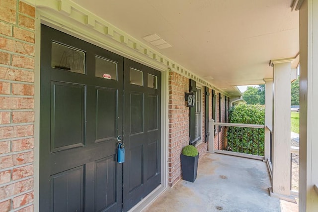7928 S Giles Rd, Douglasville, GA 30135 - property entrance featuring brick siding and covered porch