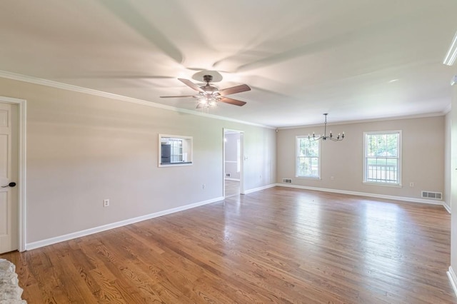 7928 S Giles Rd, Douglasville, GA 30135 - unfurnished room with ornamental molding, a chandelier, ceiling fan, wood finished floors, and baseboards