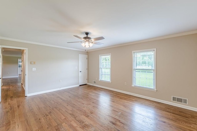 7928 S Giles Rd, Douglasville, GA 30135 - unfurnished room featuring ornamental molding, ceiling fan, baseboards, and wood finished floors