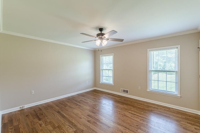 7928 S Giles Rd, Douglasville, GA 30135 - unfurnished room featuring baseboards, crown molding, wood finished floors, and ceiling fan