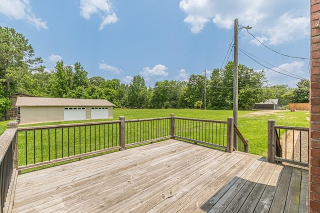 7928 S Giles Rd, Douglasville, GA 30135 - deck featuring a detached garage, an outbuilding, and a yard