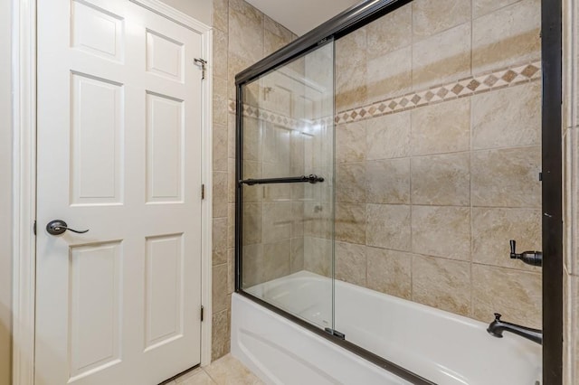 7928 S Giles Rd, Douglasville, GA 30135 - full bath featuring enclosed tub / shower combo and tile patterned flooring