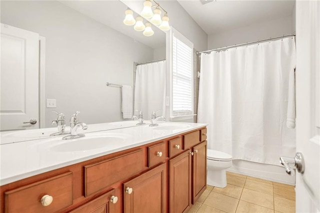 full bathroom with toilet, vanity, tile patterned floors, and shower / bathtub combination with curtain