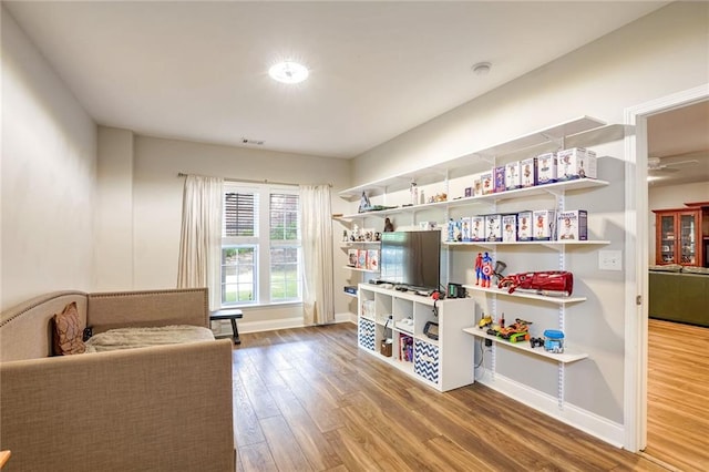 living area with wood-type flooring