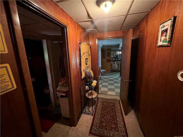2323 Valleyside Dr, Decatur, GA 30032 - hall featuring light flooring, wooden walls, and a paneled ceiling