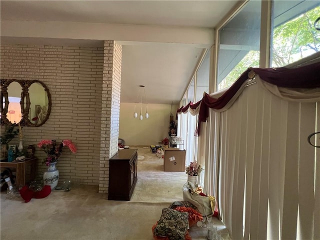 2323 Valleyside Dr, Decatur, GA 30032 - foyer entrance featuring light colored carpet and brick wall