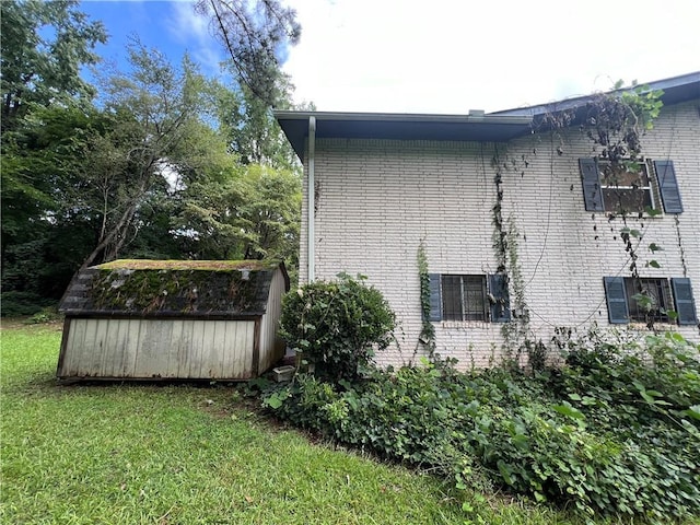 2323 Valleyside Dr, Decatur, GA 30032 - view of side of property featuring brick siding and a yard