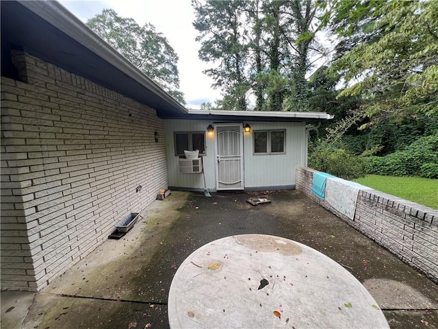 2323 Valleyside Dr, Decatur, GA 30032 - property entrance featuring a patio area and brick siding