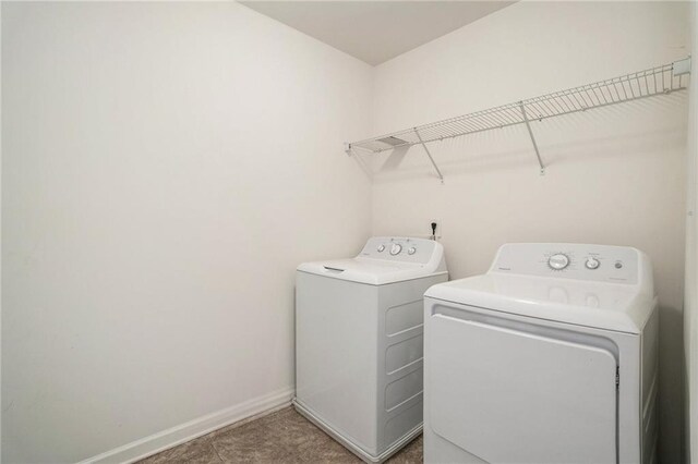 laundry area with washer and clothes dryer