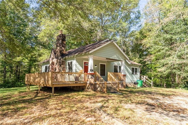 view of front of house with a deck