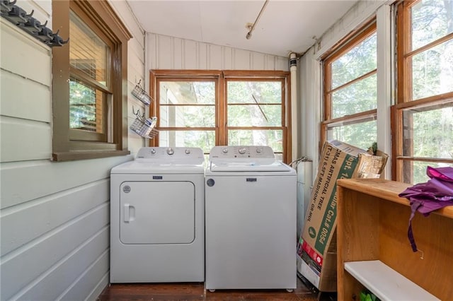 clothes washing area with laundry area and independent washer and dryer