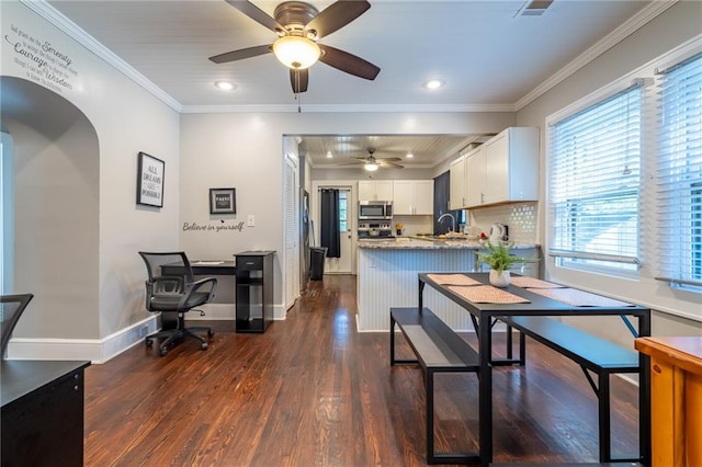 dining space with ornamental molding, recessed lighting, dark wood-style flooring, and baseboards