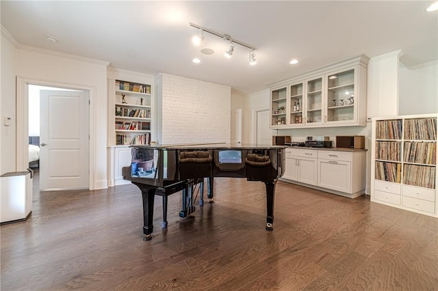 misc room featuring dark hardwood / wood-style floors and ornamental molding