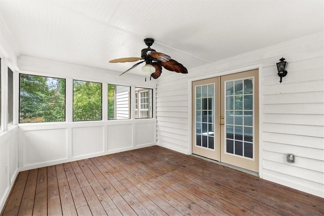 unfurnished sunroom featuring french doors and ceiling fan