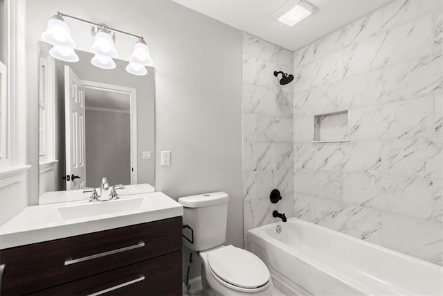 bathroom with vanity, washtub / shower combination, and toilet