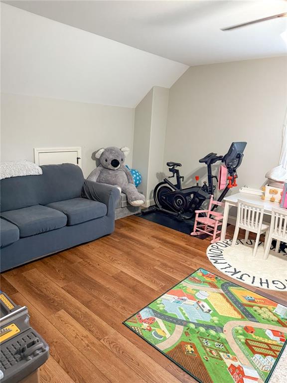 45 Albright Ct, Commerce, GA 30529 - rec room with lofted ceiling and wood finished floors