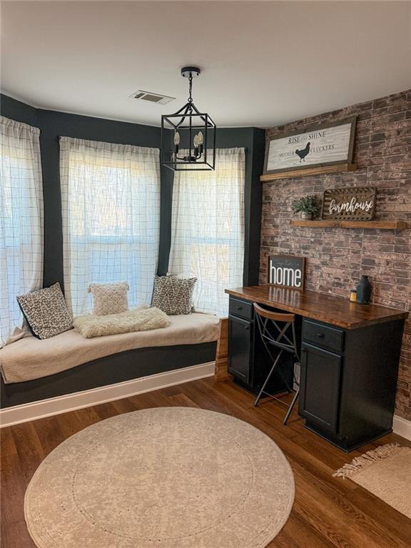 45 Albright Ct, Commerce, GA 30529 - interior space with dark wood-type flooring, visible vents, a notable chandelier, and a healthy amount of sunlight