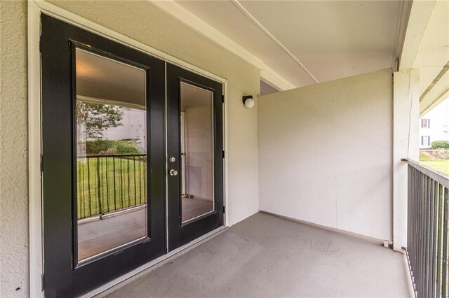 1150 Collier Rd NW Unit G8, Atlanta, GA 30318 - property entrance with stucco siding and french doors