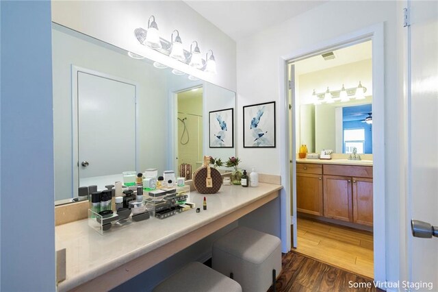 1150 Collier Rd NW Unit G8, Atlanta, GA 30318 - bathroom with wood finished floors, vanity, a shower, and ceiling fan