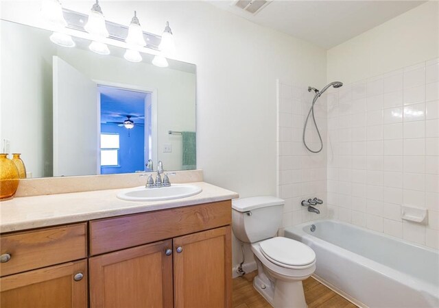 1150 Collier Rd NW Unit G8, Atlanta, GA 30318 - full bathroom with vanity, shower / tub combination, and wood finished floors
