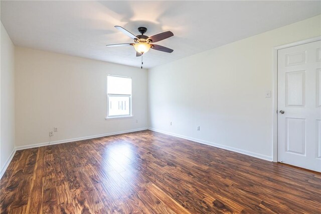1150 Collier Rd NW Unit G8, Atlanta, GA 30318 - unfurnished room featuring a ceiling fan and dark wood-type flooring