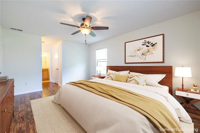 1150 Collier Rd NW Unit G8, Atlanta, GA 30318 - bedroom with dark wood finished floors, a ceiling fan, and ensuite bathroom