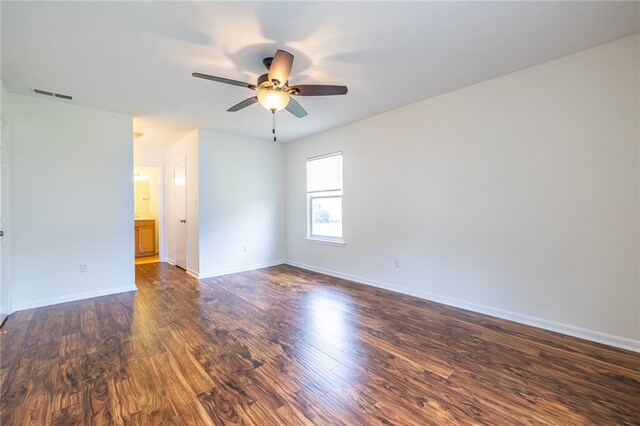 1150 Collier Rd NW Unit G8, Atlanta, GA 30318 - empty room with ceiling fan and dark wood finished floors