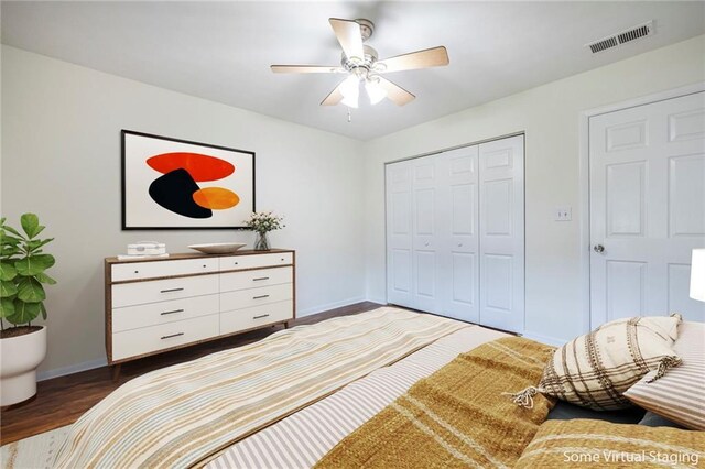1150 Collier Rd NW Unit G8, Atlanta, GA 30318 - bedroom with a closet, wood finished floors, and a ceiling fan