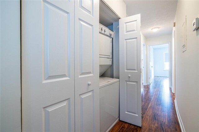 1150 Collier Rd NW Unit G8, Atlanta, GA 30318 - hall featuring estacked washer and dryer and dark wood-style flooring