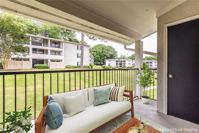 1150 Collier Rd NW Unit G8, Atlanta, GA 30318 - balcony featuring an outdoor living space