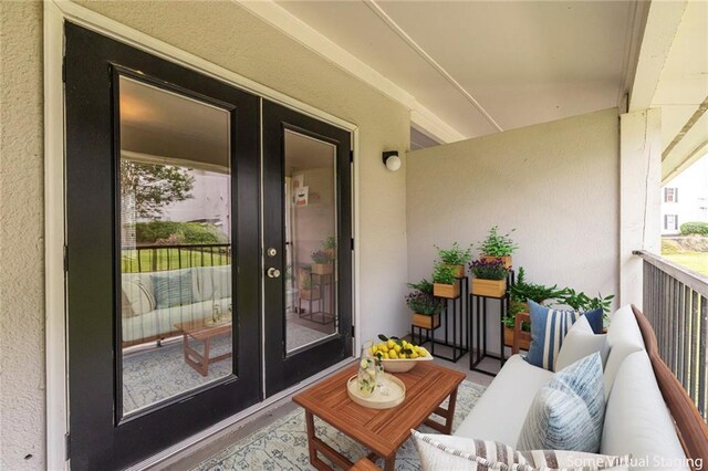 1150 Collier Rd NW Unit G8, Atlanta, GA 30318 - balcony with french doors and outdoor lounge area