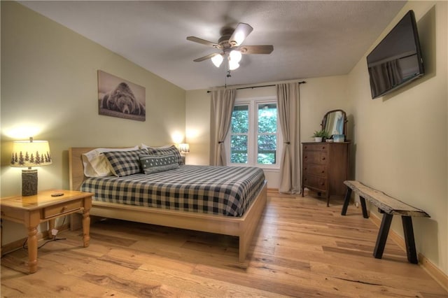 276 Pine Ridge Rd, Ellijay, GA 30536 - bedroom with light wood-type flooring and a ceiling fan