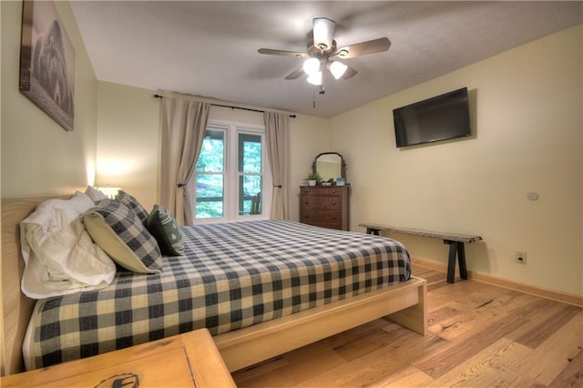 276 Pine Ridge Rd, Ellijay, GA 30536 - bedroom with wood finished floors and a ceiling fan