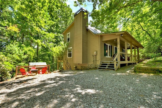 276 Pine Ridge Rd, Ellijay, GA 30536 - view of side of property featuring a chimney