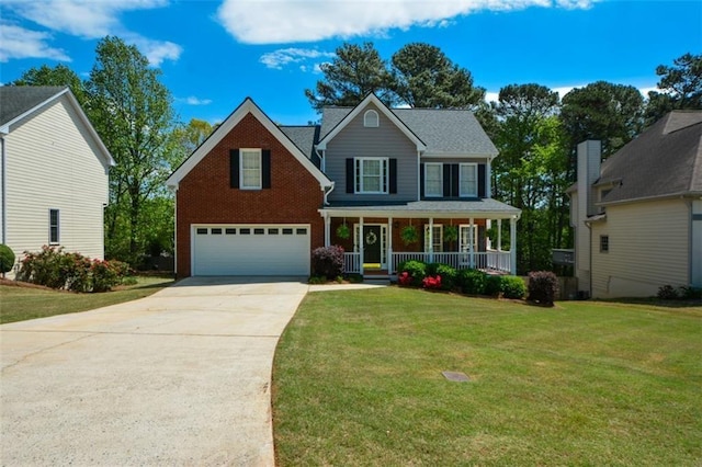 view of front facade featuring covered porch, a front yard, brick siding, a garage, and concrete driveway