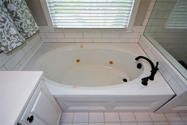 bathroom with a jetted tub